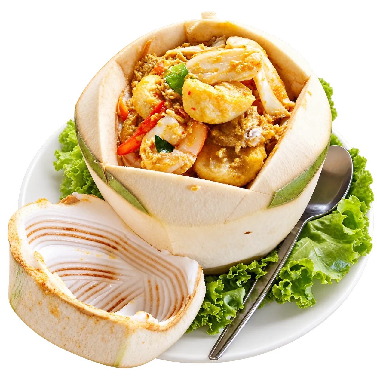 Meeresfrüchte-Curry in der Kokosnuss serviert